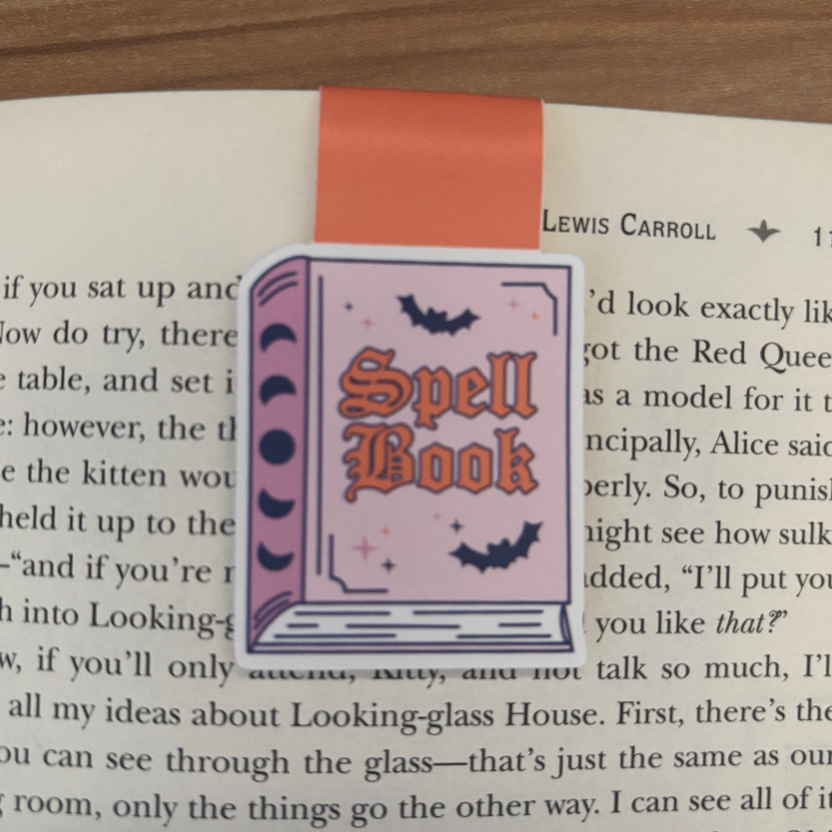 Magical spell book bookmark on a page of a book