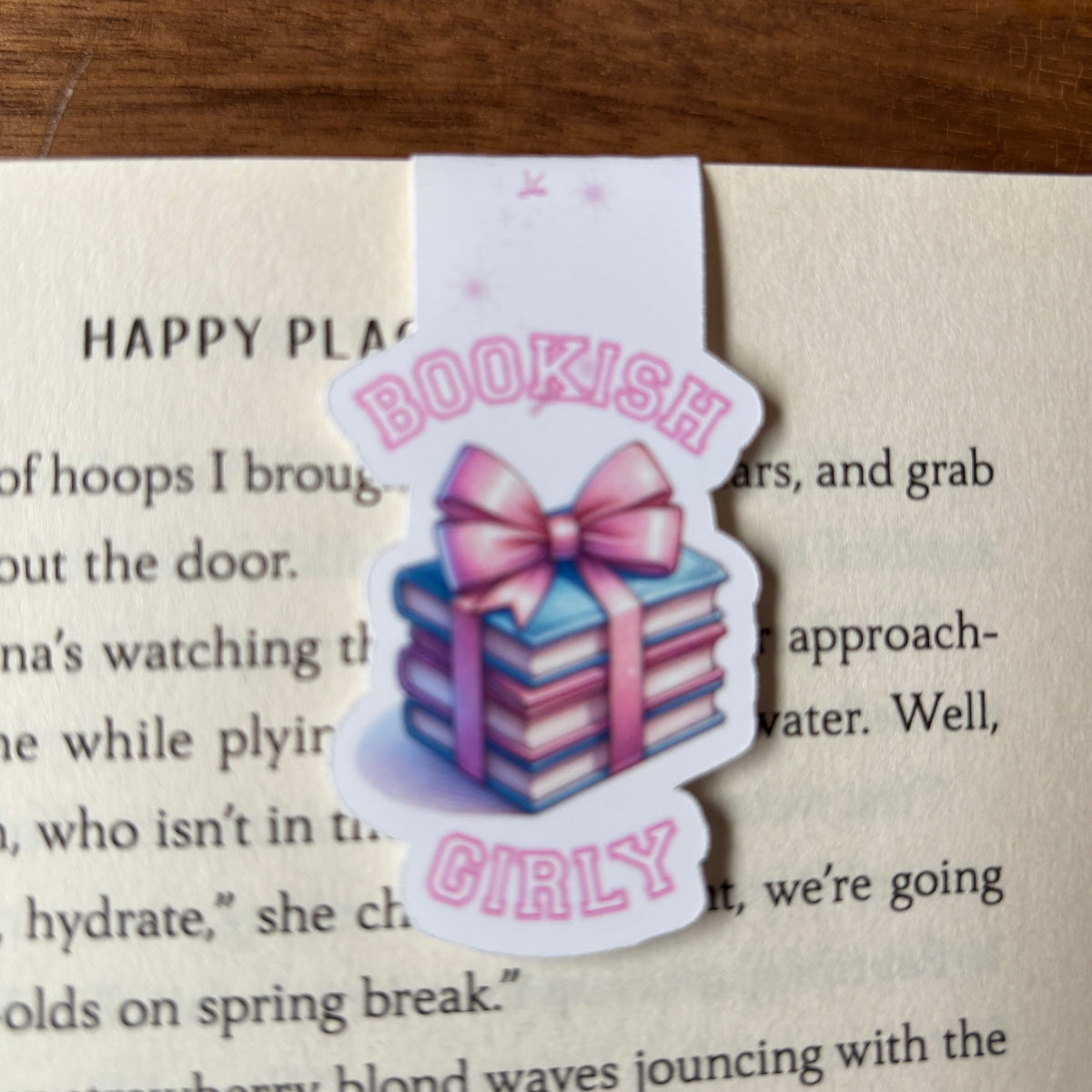 Bookmark with 'Bookish Girly' text on a book page