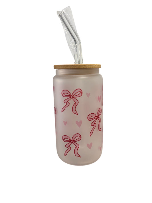 Tumbler with pink bows and hearts on a white background