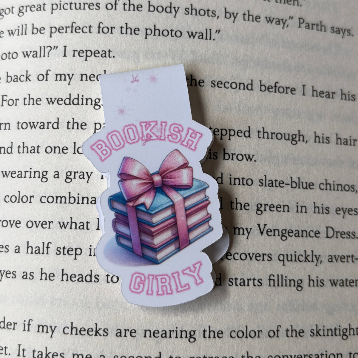 magnetic bookmark with 'Bookish Girly' design on a book page