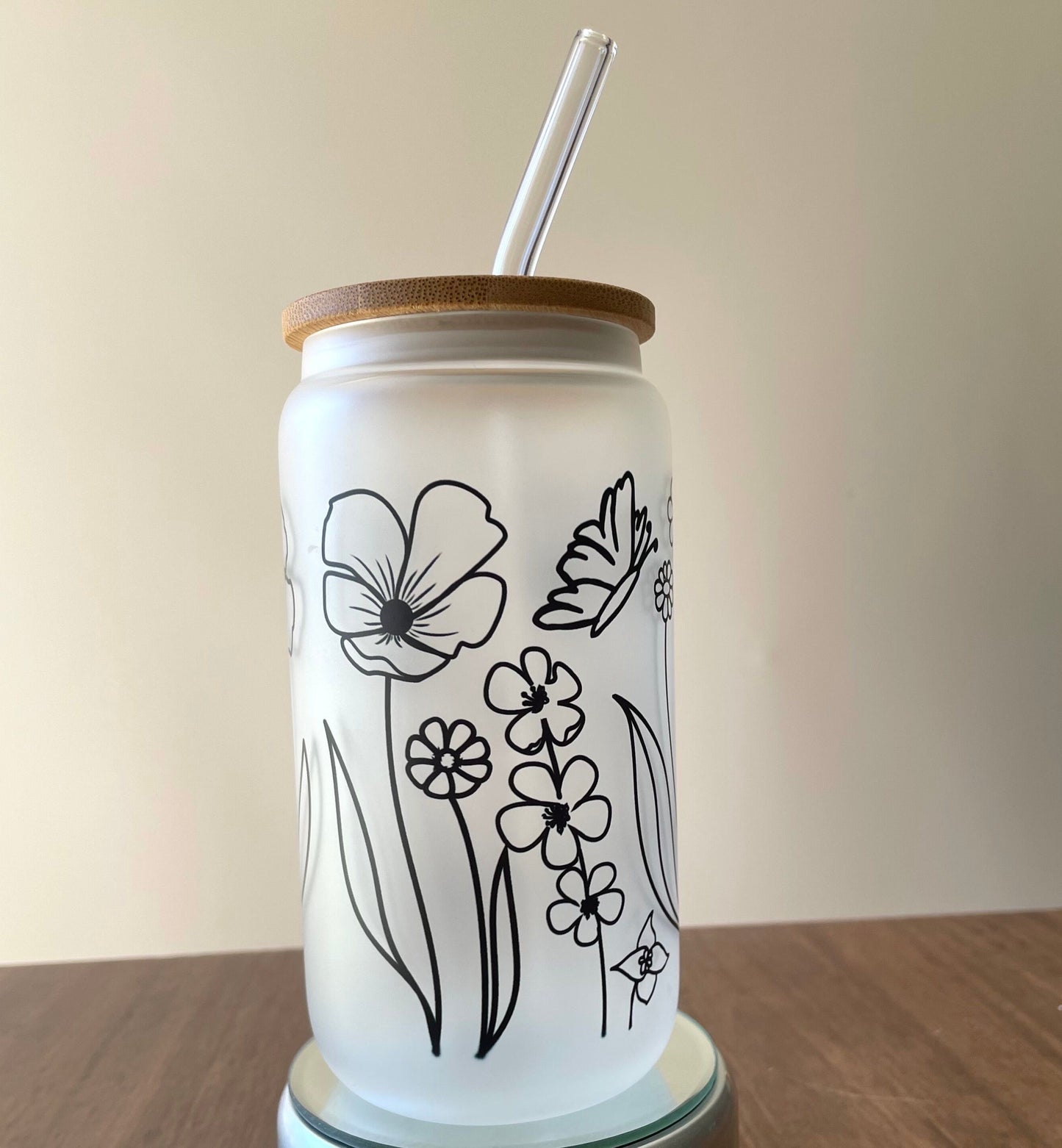 Flowers Sublimated 16oz Frosted Libbey Glass Can with Bamboo Lid and reusable straw.