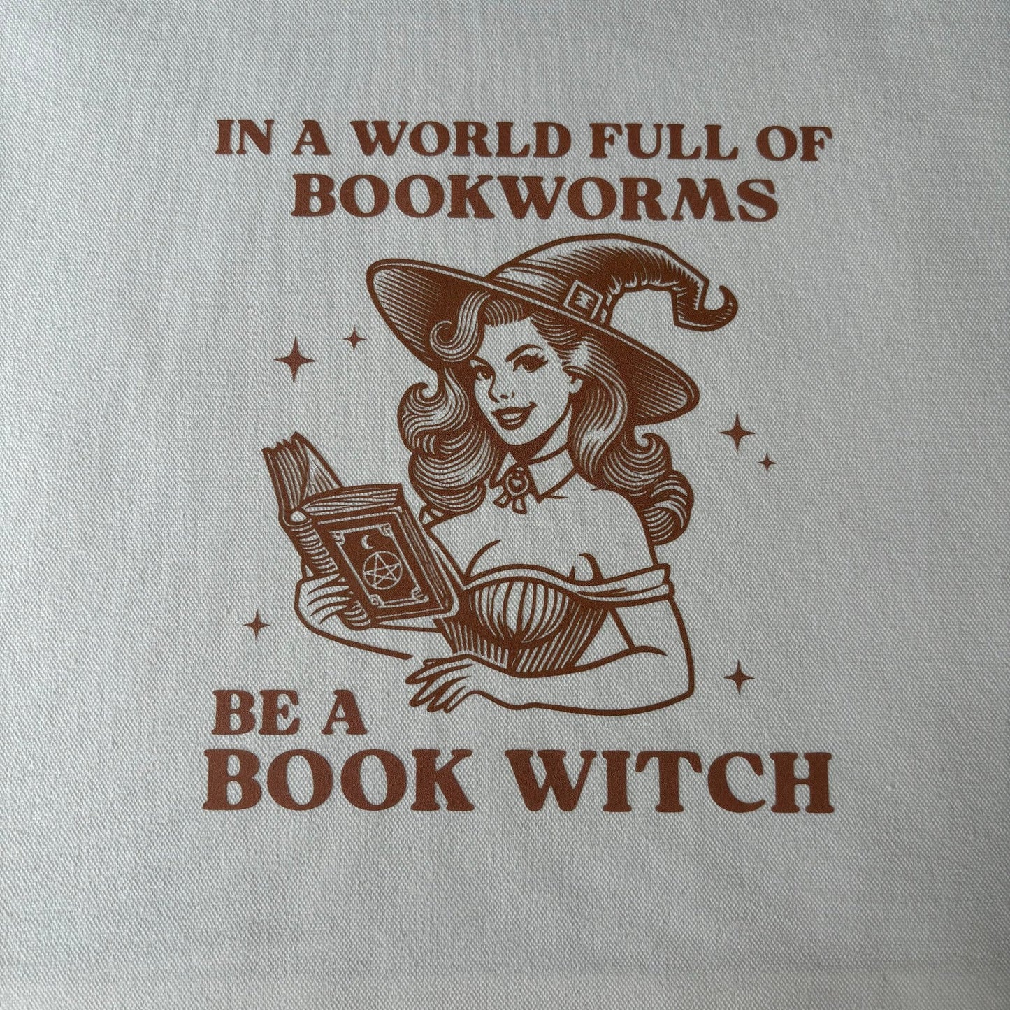 In a World Full of Book Worms Be A Book Witch Tote Bag