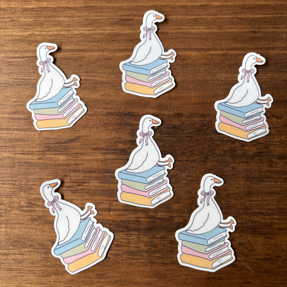 Goose on Book Stack Vinyl Die Cut Laminated Sticker