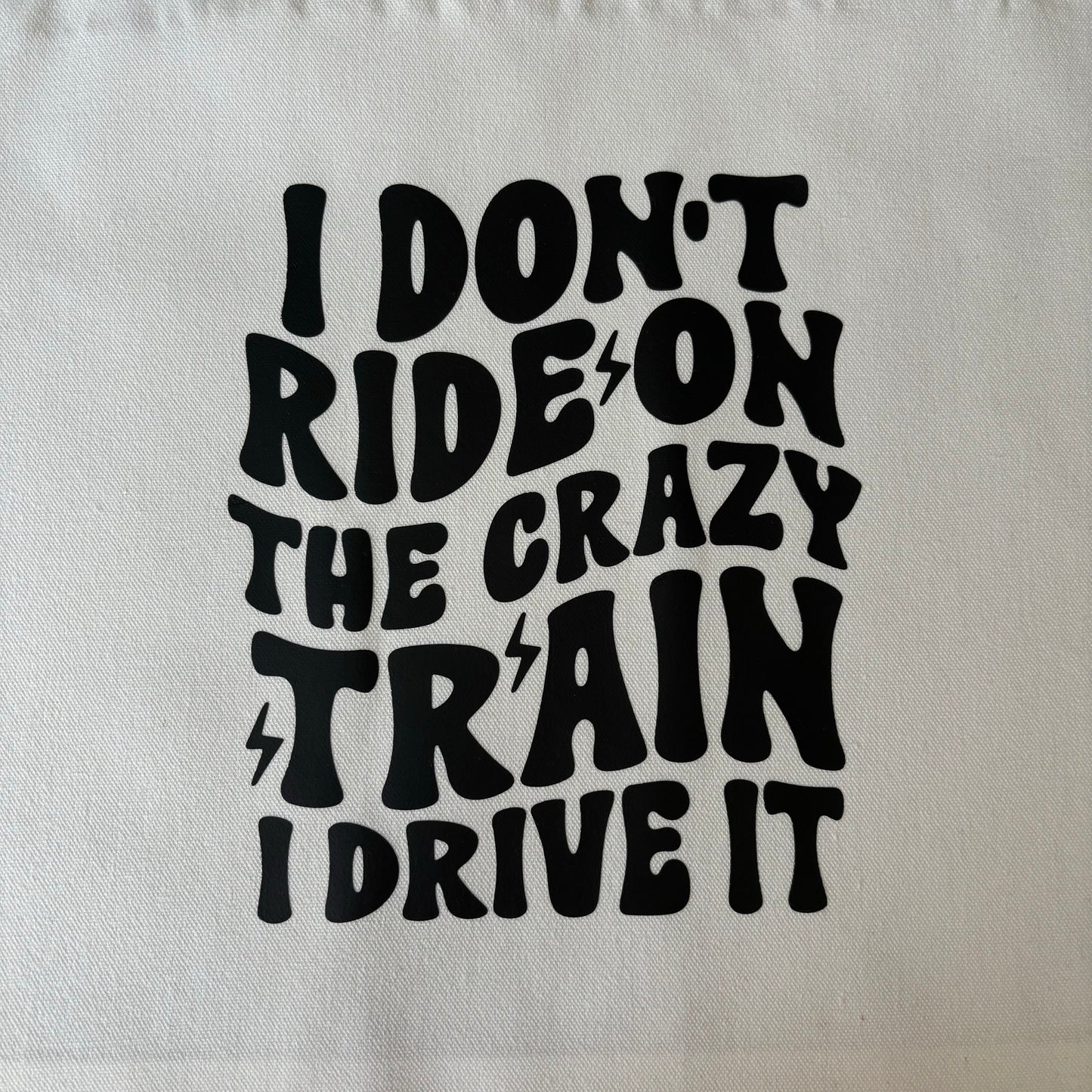 I Don't Ride on the Crazy Train I Drive It Tote Bag