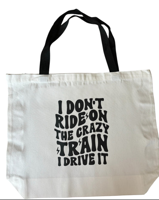 I Don't Ride on the Crazy Train I Drive It Tote Bag