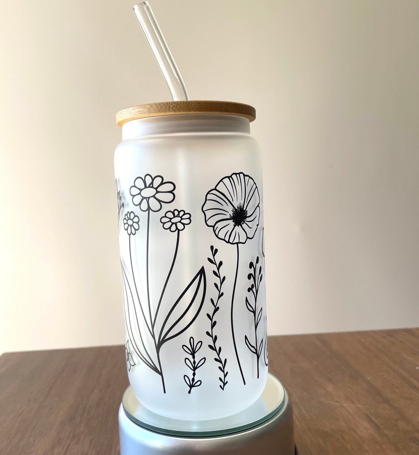 Flowers Sublimated 16oz Frosted Libbey Glass Can with Bamboo Lid and reusable straw.